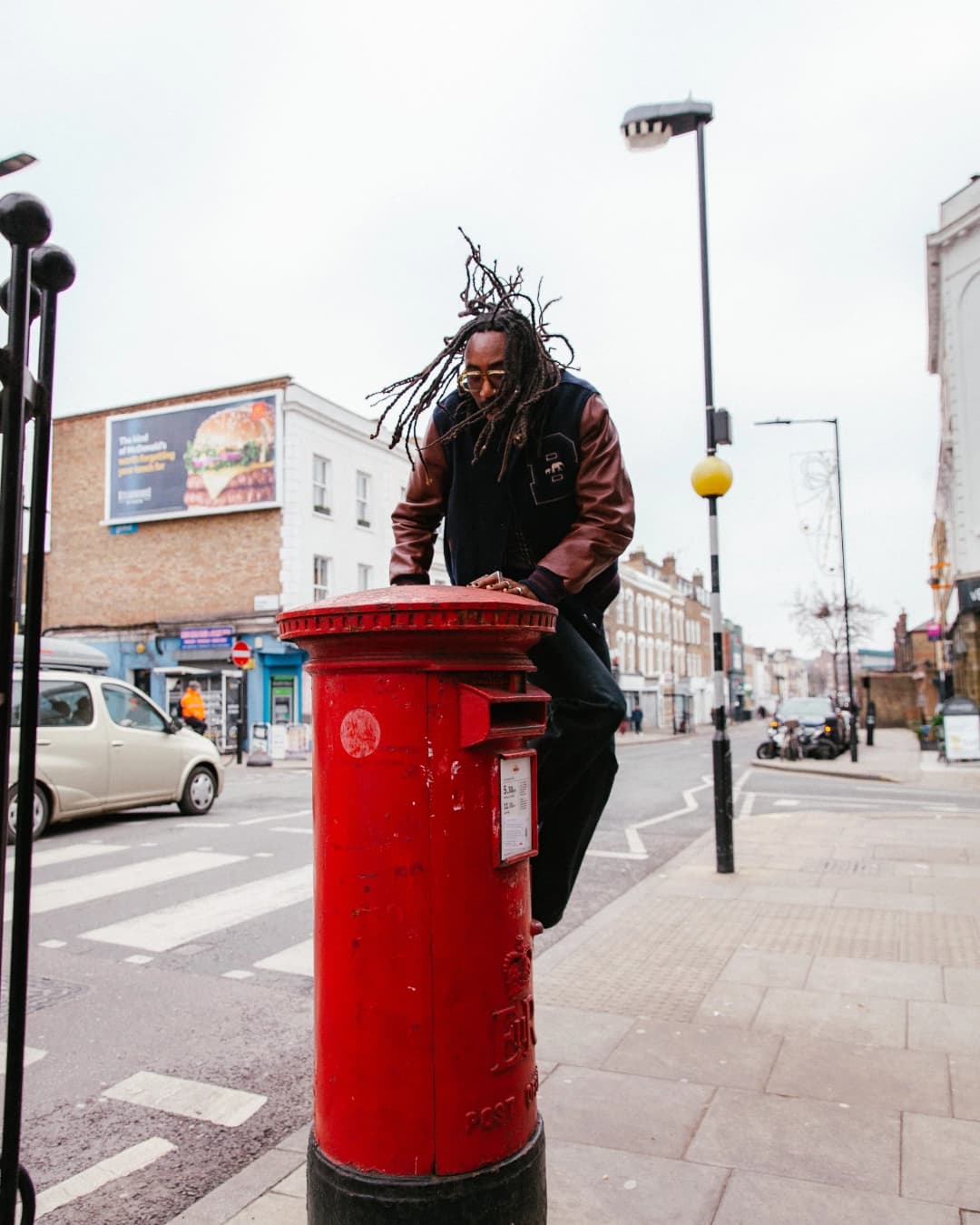 Seye Adelekan at post box, photographed by Simply Good Studio